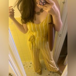 Mustard jumpsuit with stripes. Previously worn, but perfect condition. Size M.